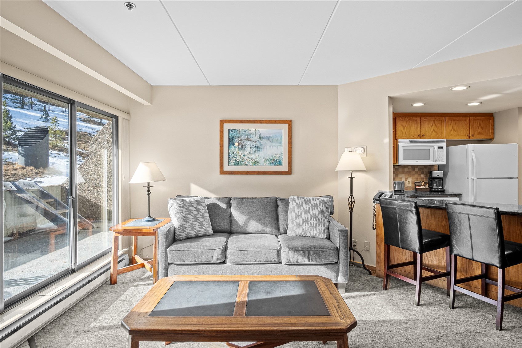 640 Village Road, Unit 4110 Breckenridge, CO 80424 - Photo 3 of 50 a living room with furniture and a view of kitchen