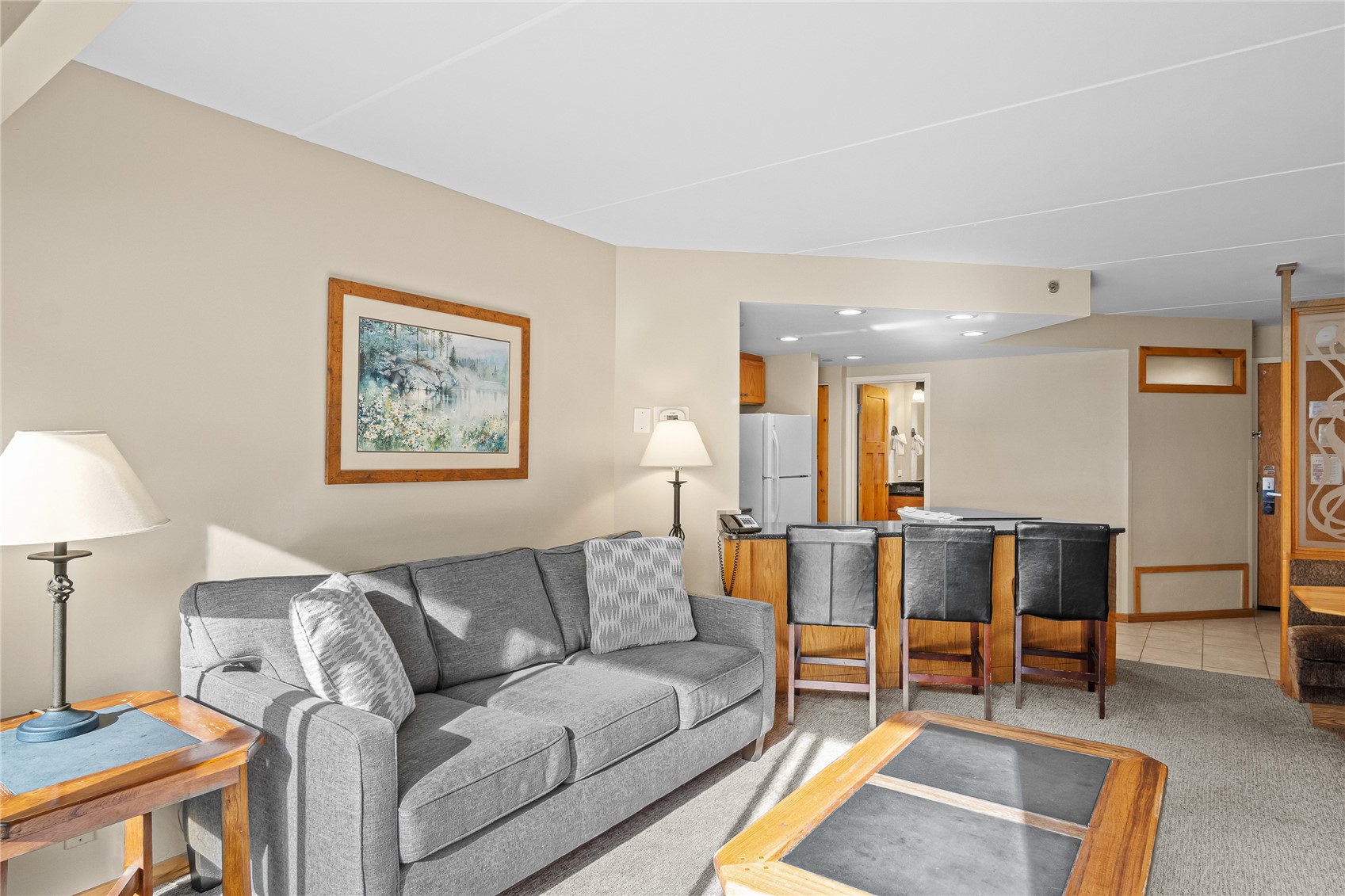 640 Village Road, Unit 4110 Breckenridge, CO 80424 - Photo 4 of 50 a living room with furniture and a table