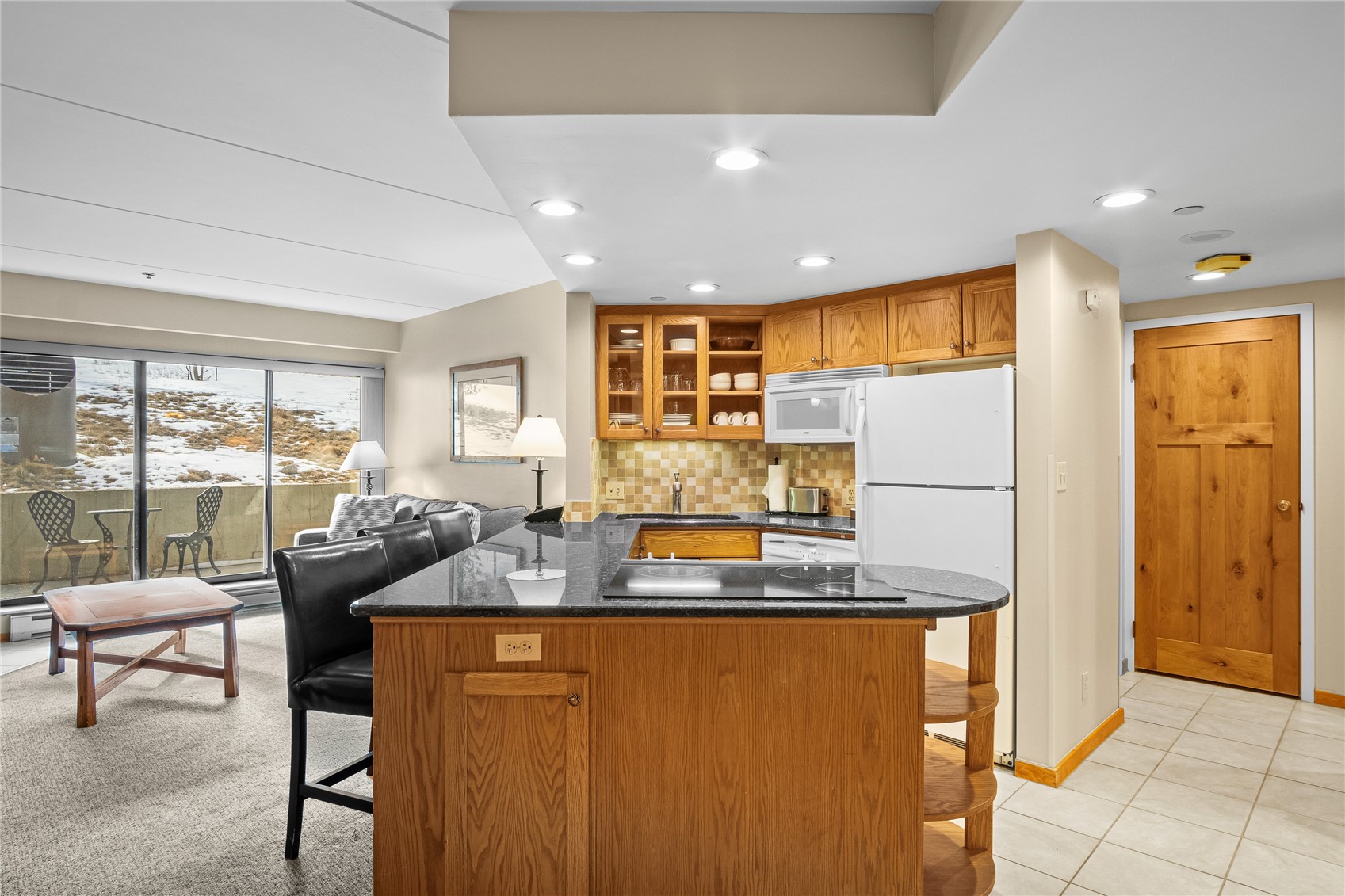640 Village Road, Unit 4110 Breckenridge, CO 80424 - Photo 10 of 50 a living room with stainless steel appliances granite countertop furniture a couch and a large window