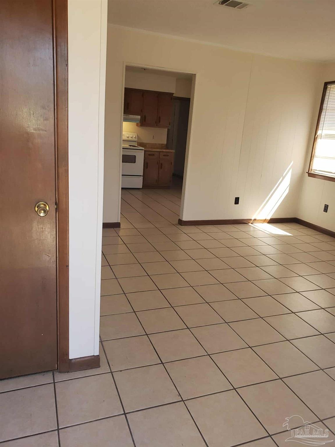 820 Calhoun Avenue, Unit A Pensacola, FL 32507 - Photo 3 of 9 a view of a utility room and utility room