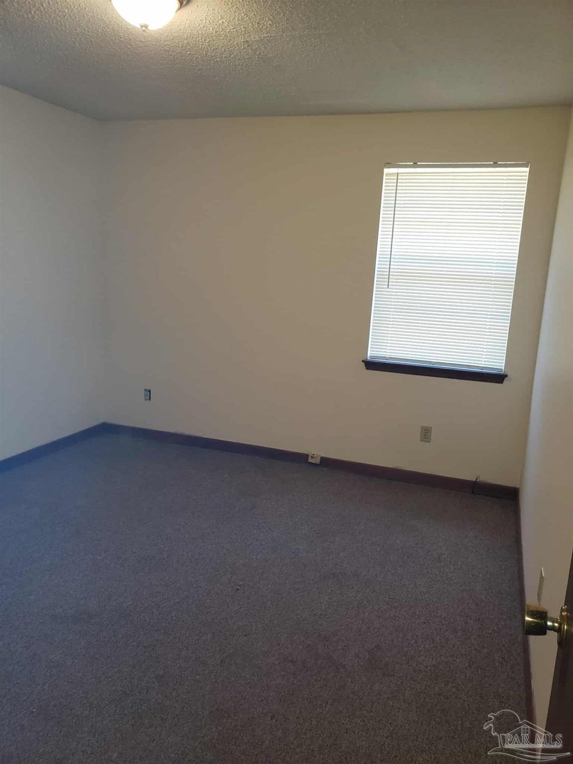 820 Calhoun Avenue, Unit A Pensacola, FL 32507 - Photo 8 of 9 a view of room