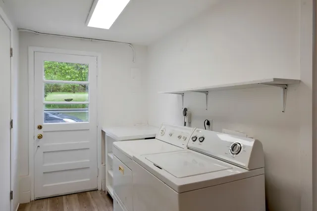 a utility room with dryer and washer