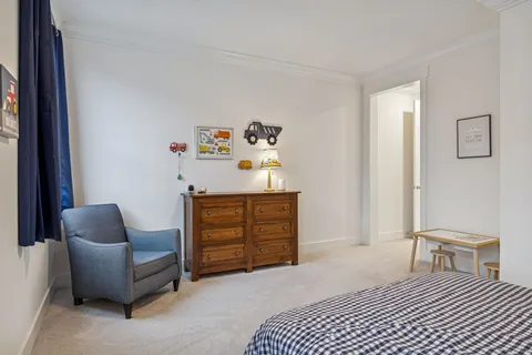 a view of parking garage with cars