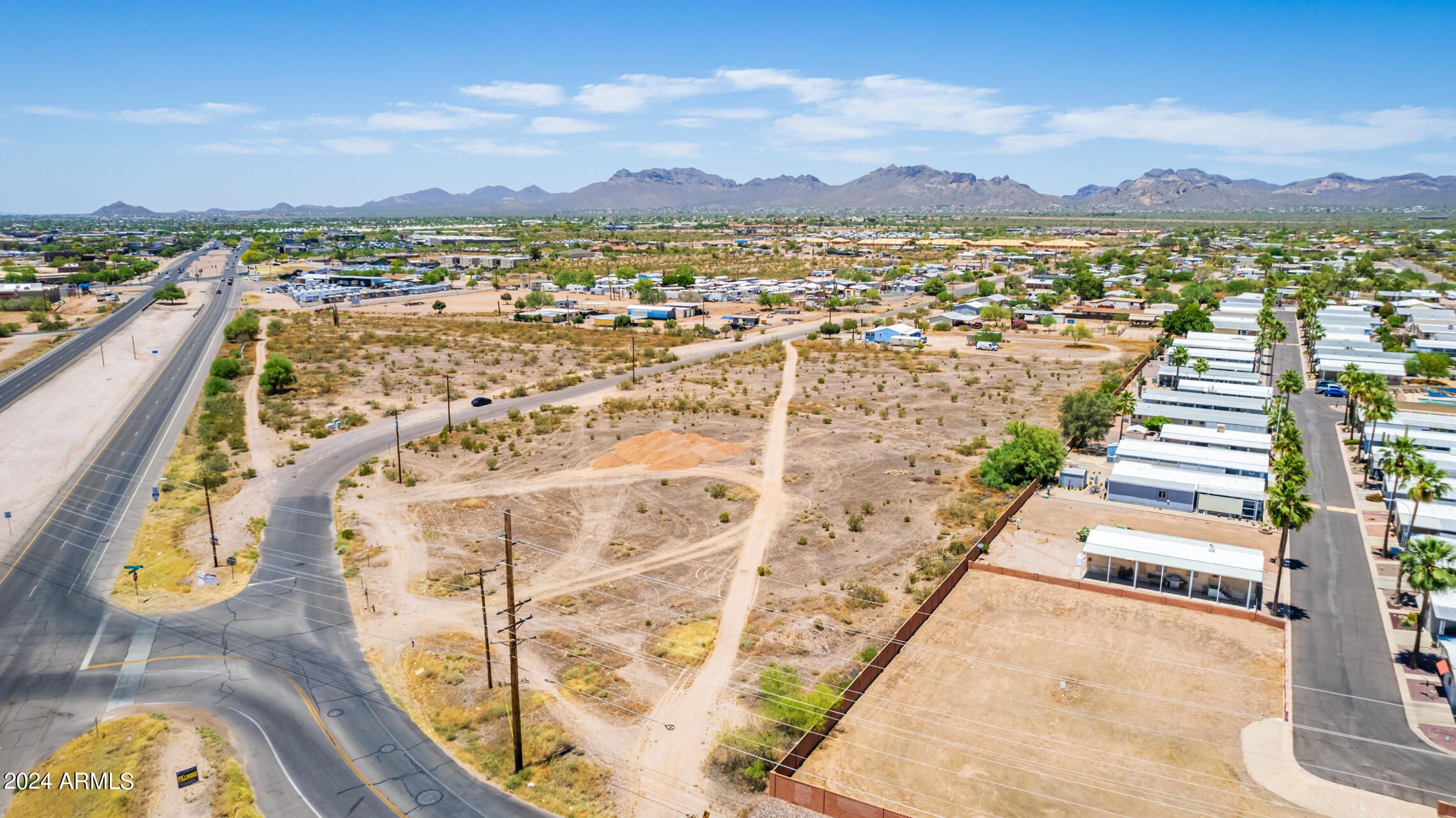 880 South Royal Palm Road, Unit LOT #1 Apache Junction, AZ 85119 - Photo 4 of 19 an aerial view of residential building and ocean view