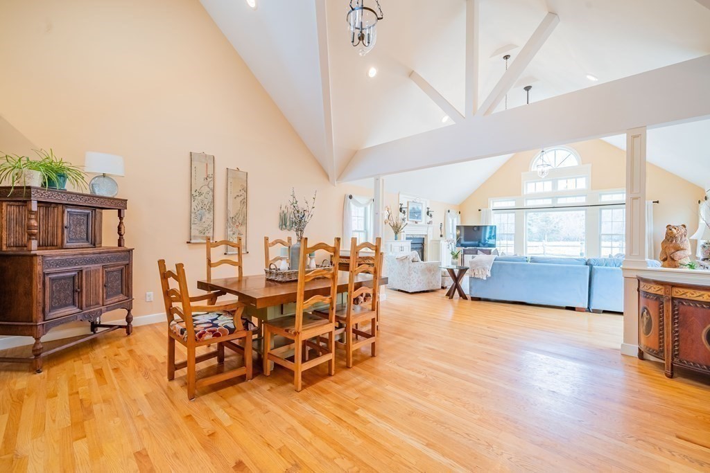 51 Robinson Road Lexington, MA 02420 - Photo 14 of 42 a view of a dining room with furniture and a large window