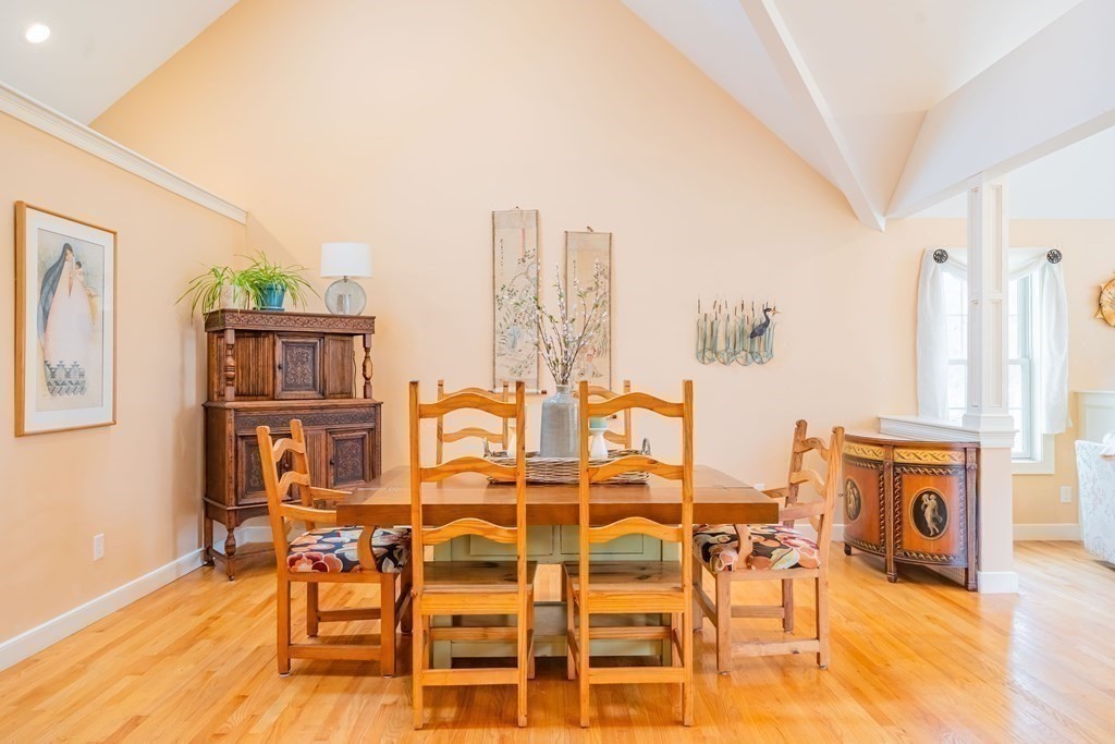 51 Robinson Road Lexington, MA 02420 - Photo 15 of 42 a dining room with furniture and wooden floor