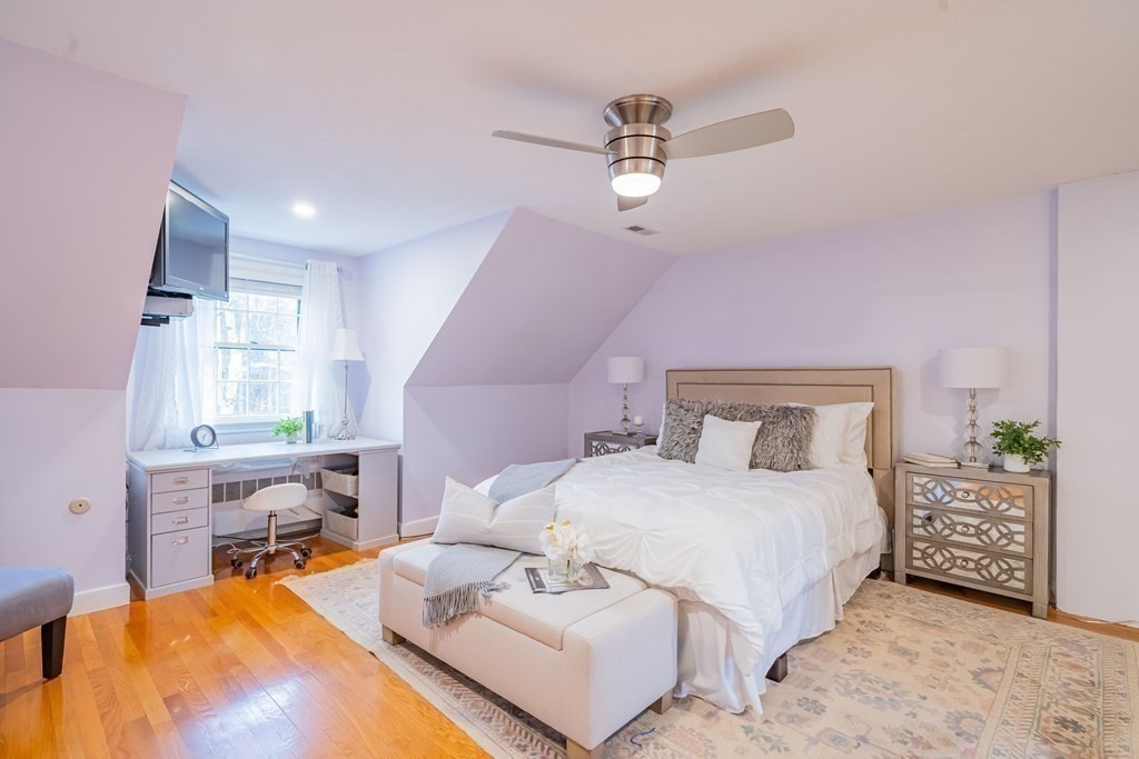 51 Robinson Road Lexington, MA 02420 - Photo 25 of 42 a bedroom with a bed and furniture