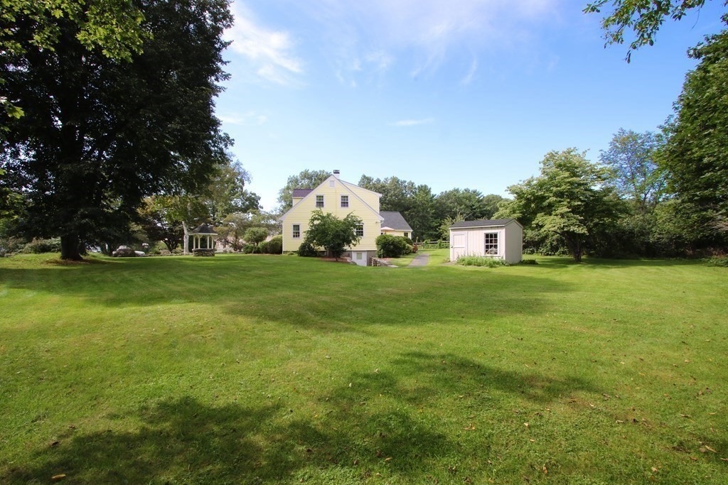 51 Robinson Road Lexington, MA 02420 - Photo 38 of 42 a view of a green field with sitting area