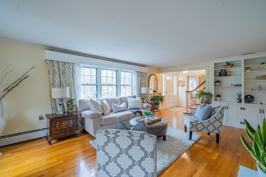 51 Robinson Road Lexington, MA 02420 - Photo 4 of 42 a living room with furniture and a large window
