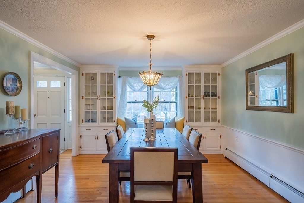 51 Robinson Road Lexington, MA 02420 - Photo 6 of 42 a view of a dining room with furniture window and wooden floor