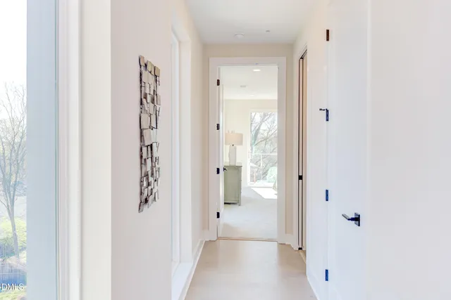 a spacious bedroom with a bed and walk in closet