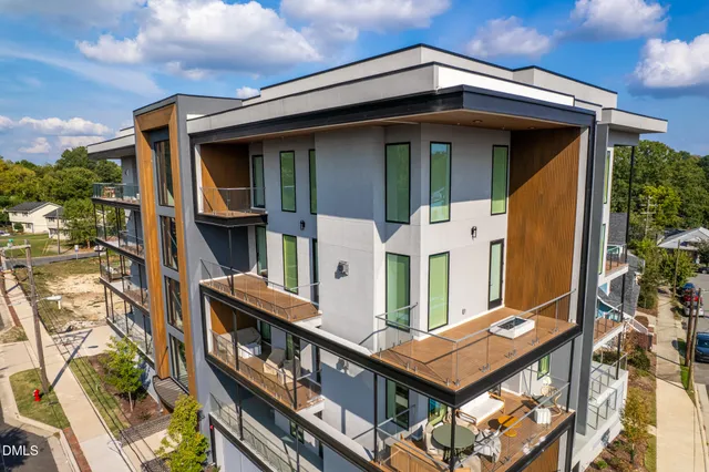 a view of entryway with wooden floor and stairs