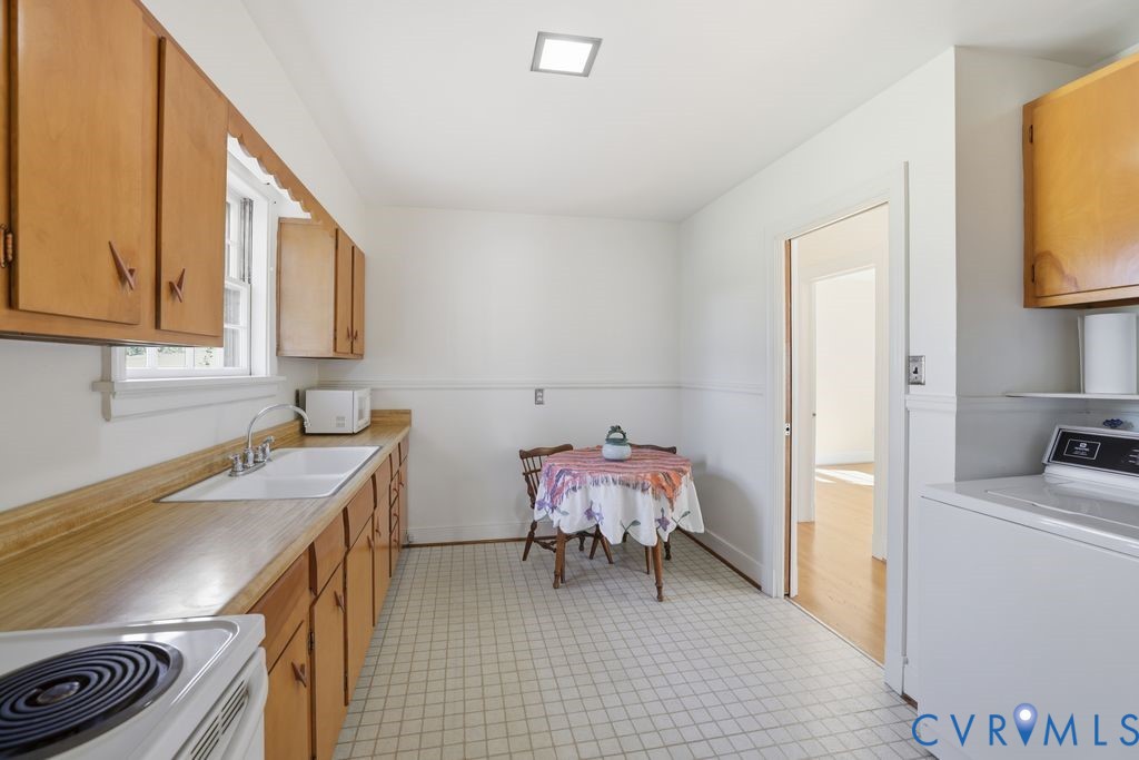 2206 Valentine Road Henrico, VA 23228 - Photo 14 of 45 a view of a kitchen area with furniture and wooden floor
