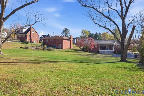 a view of a house with a big yard