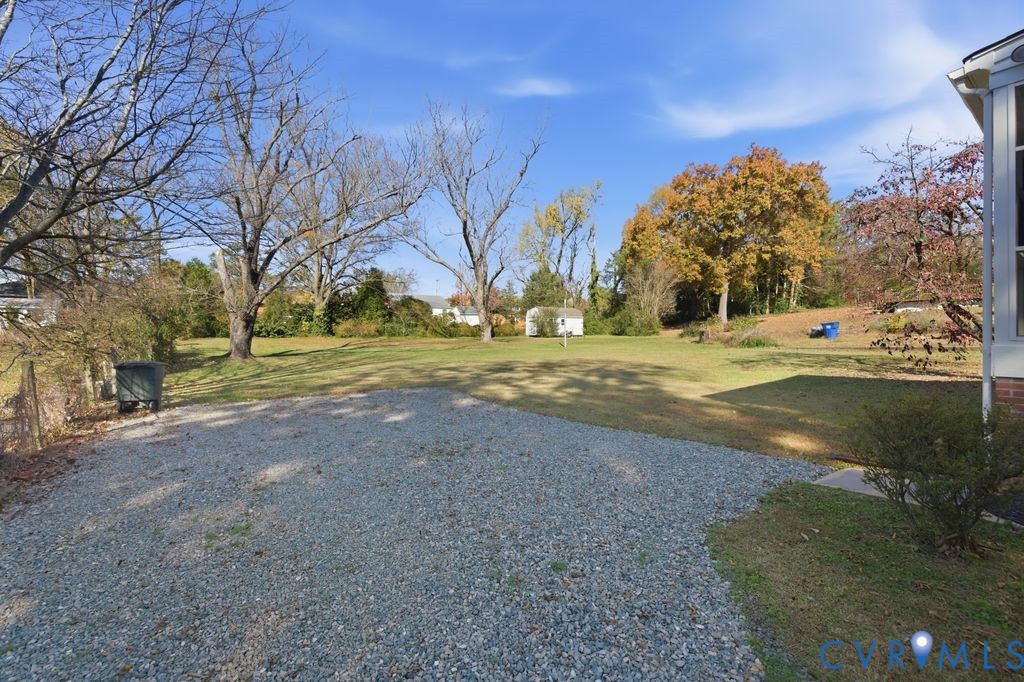 2206 Valentine Road Henrico, VA 23228 - Photo 36 of 45 a view of road with large trees