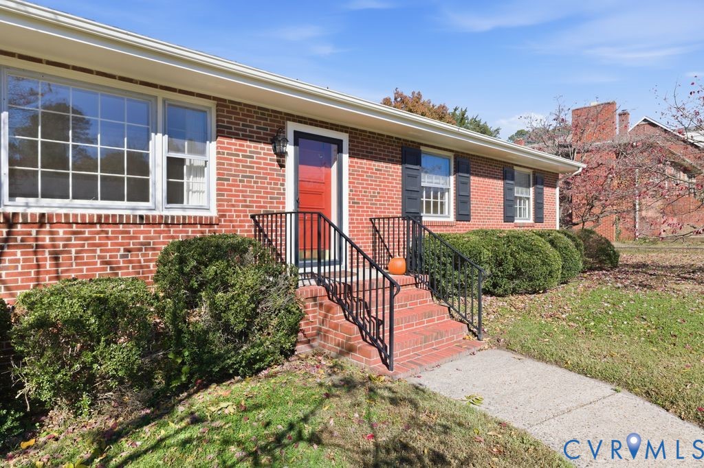 2206 Valentine Road Henrico, VA 23228 - Photo 7 of 45 a front view of a house with a yard