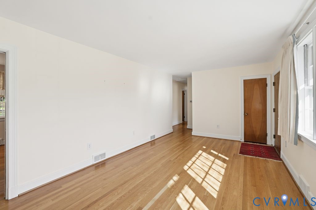 2206 Valentine Road Henrico, VA 23228 - Photo 10 of 45 a view of an empty room and window