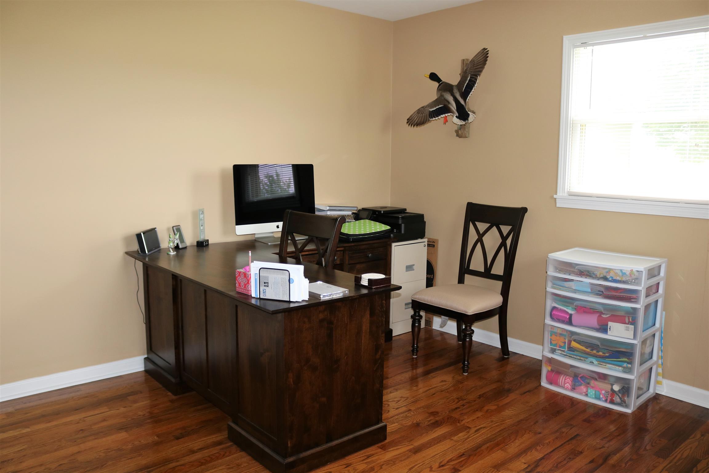 5937 Lakeview Road Springfield, TN 37172 - Photo 17 of 26 a view of a workspace with furniture and wooden floor