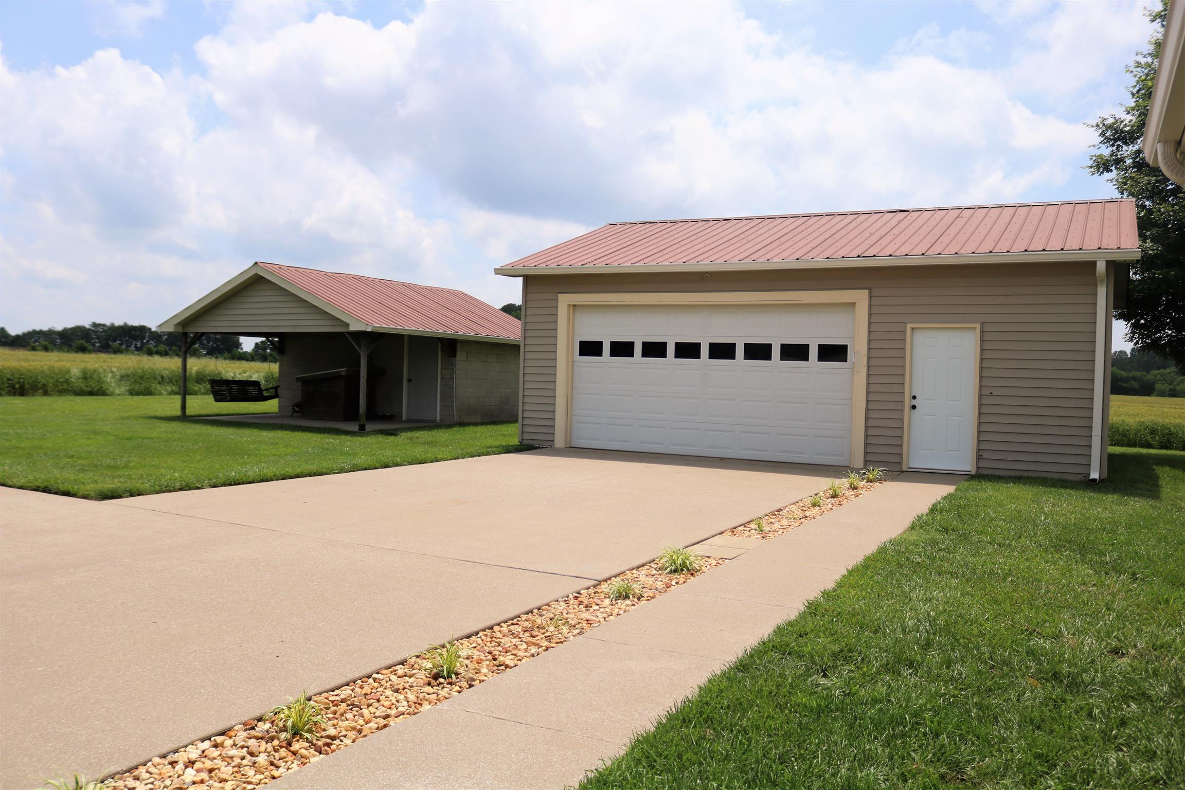 5937 Lakeview Road Springfield, TN 37172 - Photo 2 of 26 a front view of a house with a yard and garage