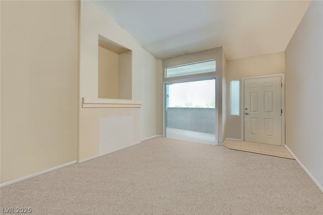 2305 West Horizon Ridge Parkway, Unit 1223 Henderson, NV 89052 - Photo 9 of 28 Unfurnished room with carpet and baseboards