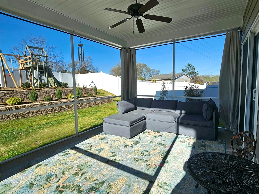 209 Furness Drive Fountain Inn, SC 29644 - Photo 28 of 33 Relax in this screened porch offering views of the private yard.