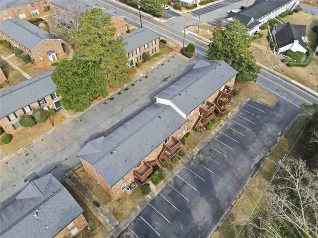 a view of a balcony with wooden floor
