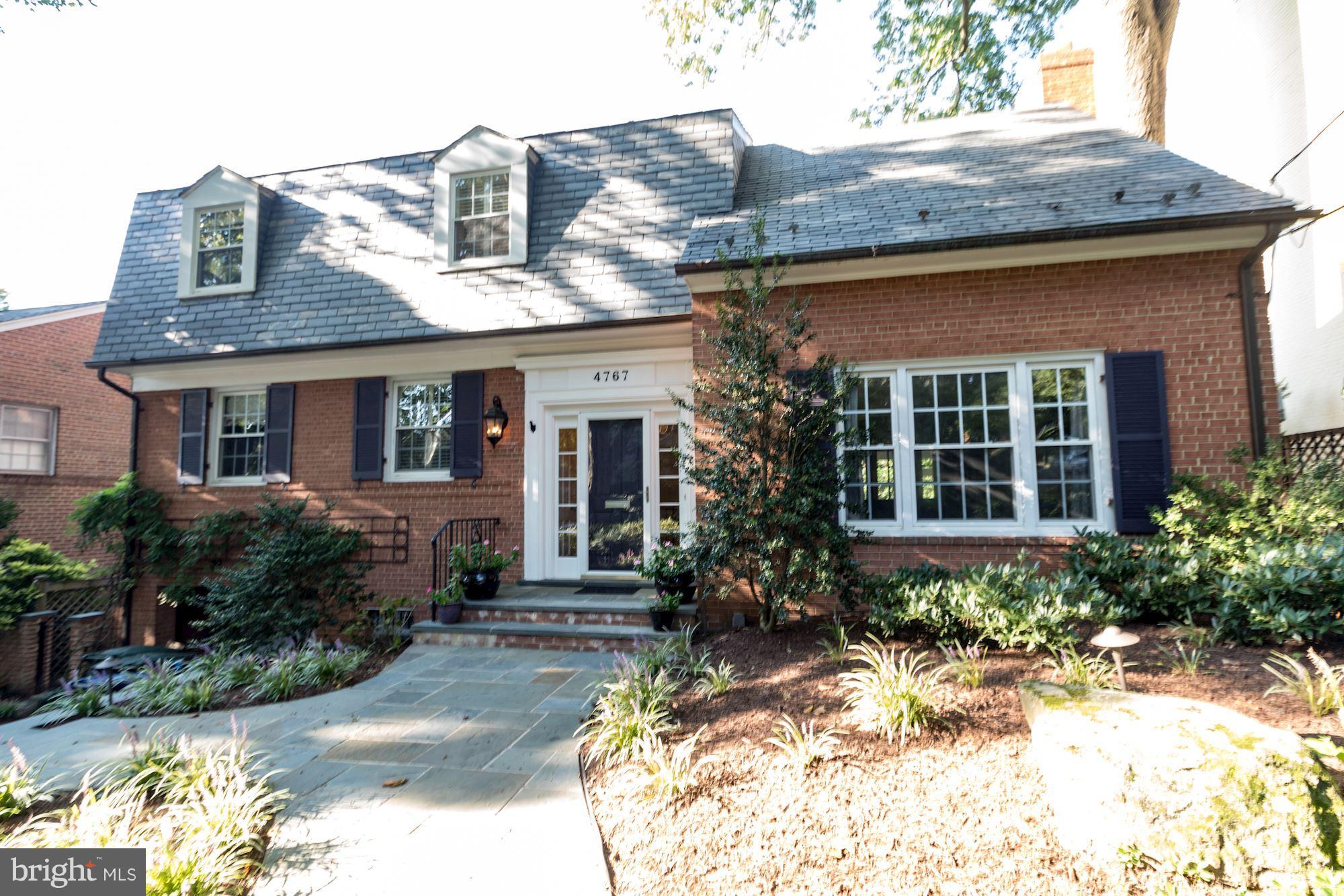 4767 Berkeley Terrace Northwest Washington, DC 20007 - Photo 2 of 30 a front view of a house with garden