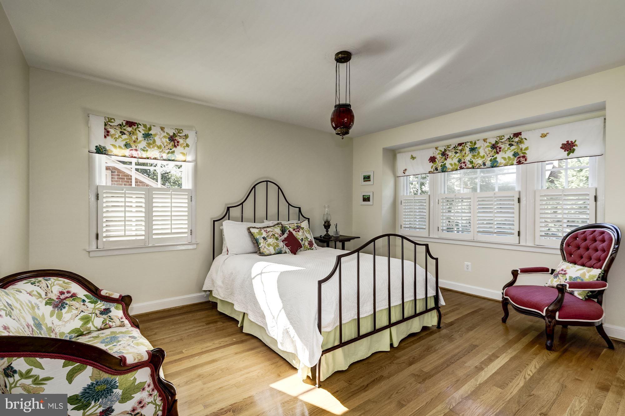 4767 Berkeley Terrace Northwest Washington, DC 20007 - Photo 21 of 30 a bedroom with a bed chair and a window