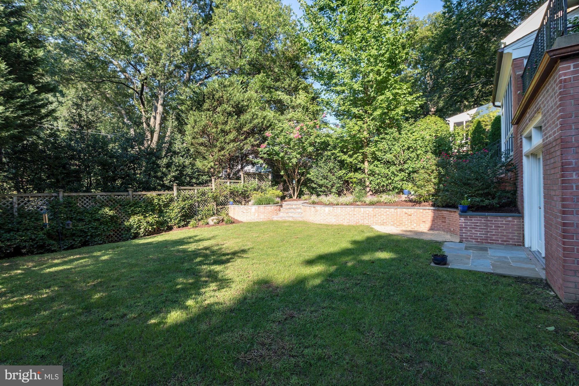 4767 Berkeley Terrace Northwest Washington, DC 20007 - Photo 29 of 30 a view of green field with trees in the background