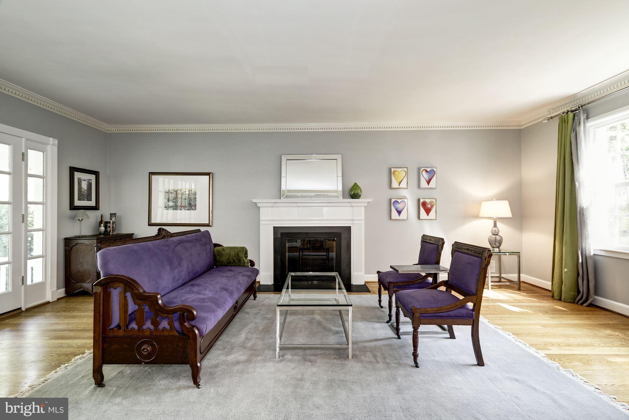 4767 Berkeley Terrace Northwest Washington, DC 20007 - Photo 5 of 30 a living room with furniture and a fireplace