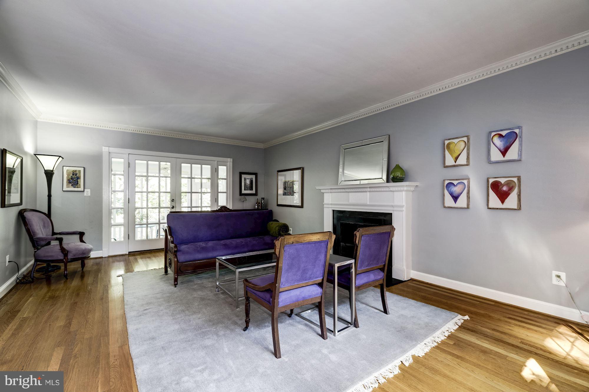 4767 Berkeley Terrace Northwest Washington, DC 20007 - Photo 6 of 30 a living room with furniture and a fireplace