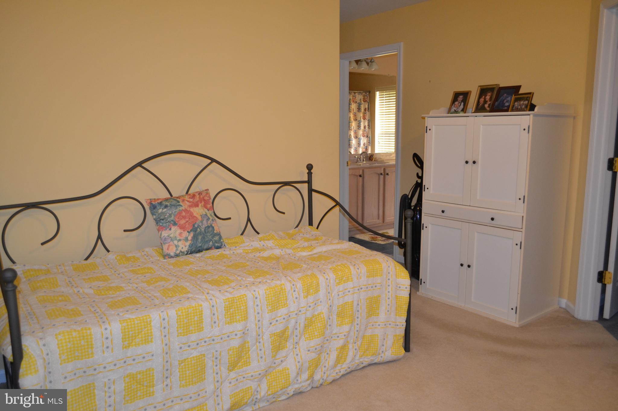 40 Brentwood Road Upper Chichester, PA 19061 - Photo 52 of 95 a bedroom with a bed and cabinets