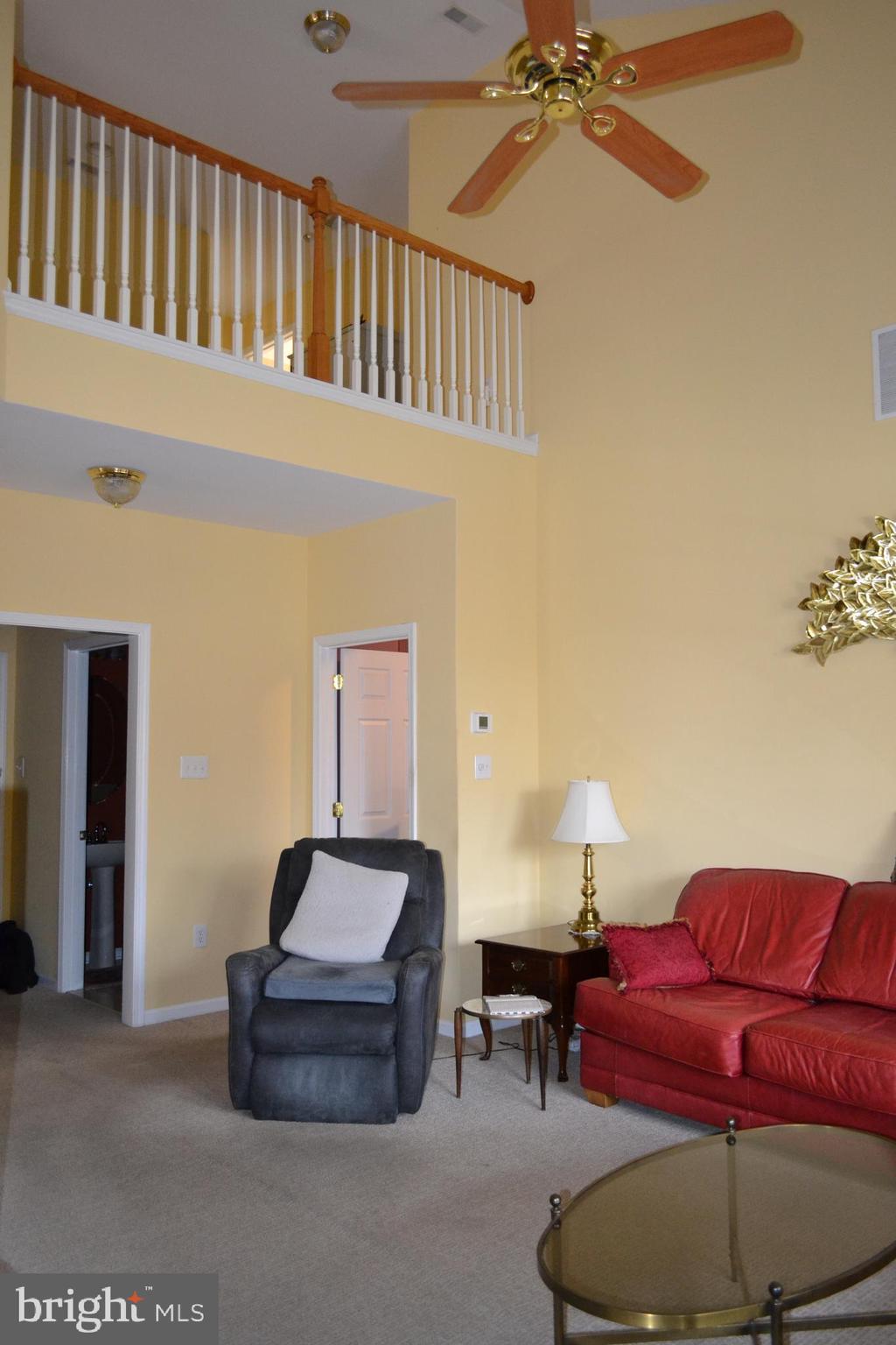 40 Brentwood Road Upper Chichester, PA 19061 - Photo 83 of 95 a living room with furniture and a chandelier