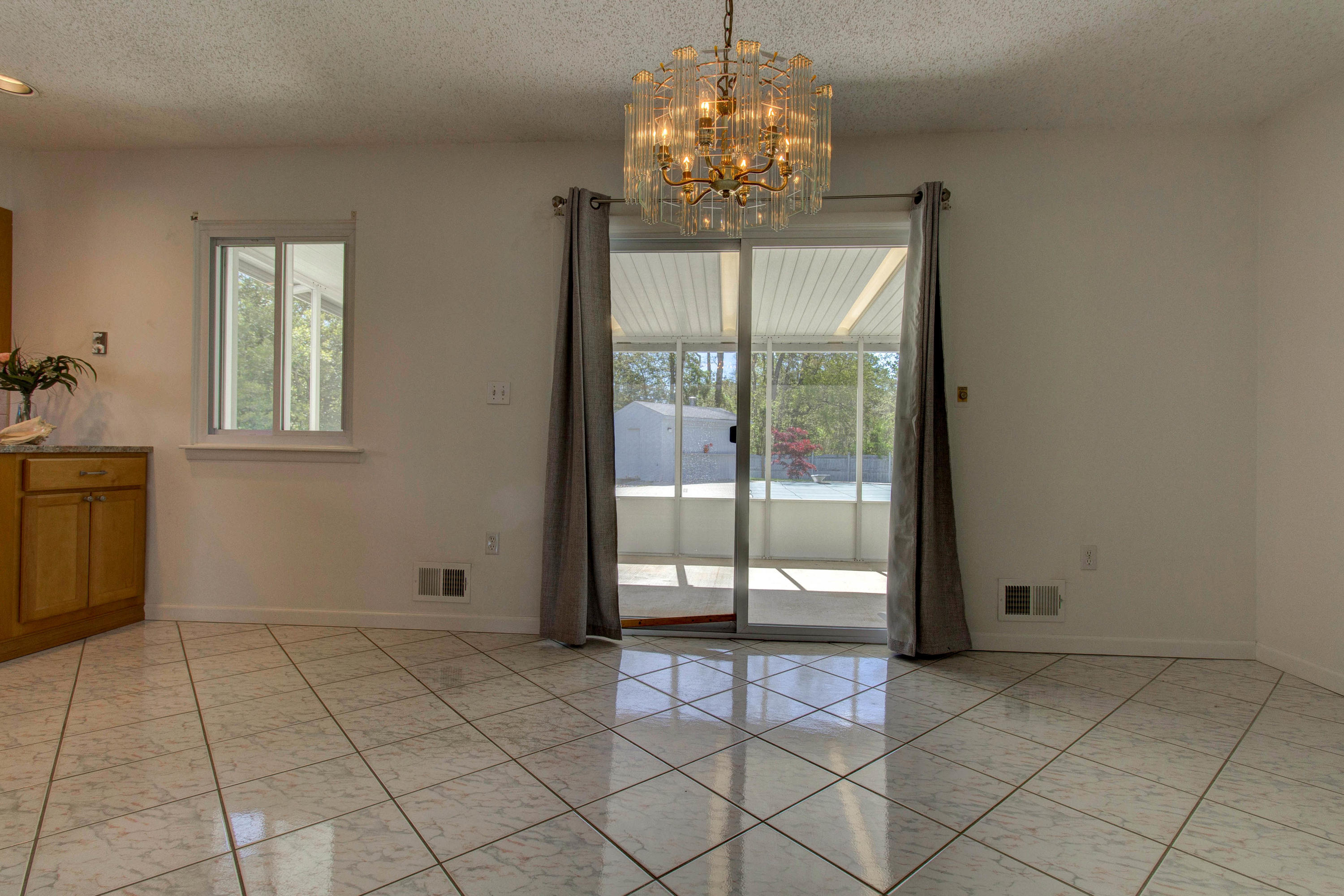 107 Reflection Road Toms River, NJ 08753 - Photo 13 of 29 a view of an empty room with a window