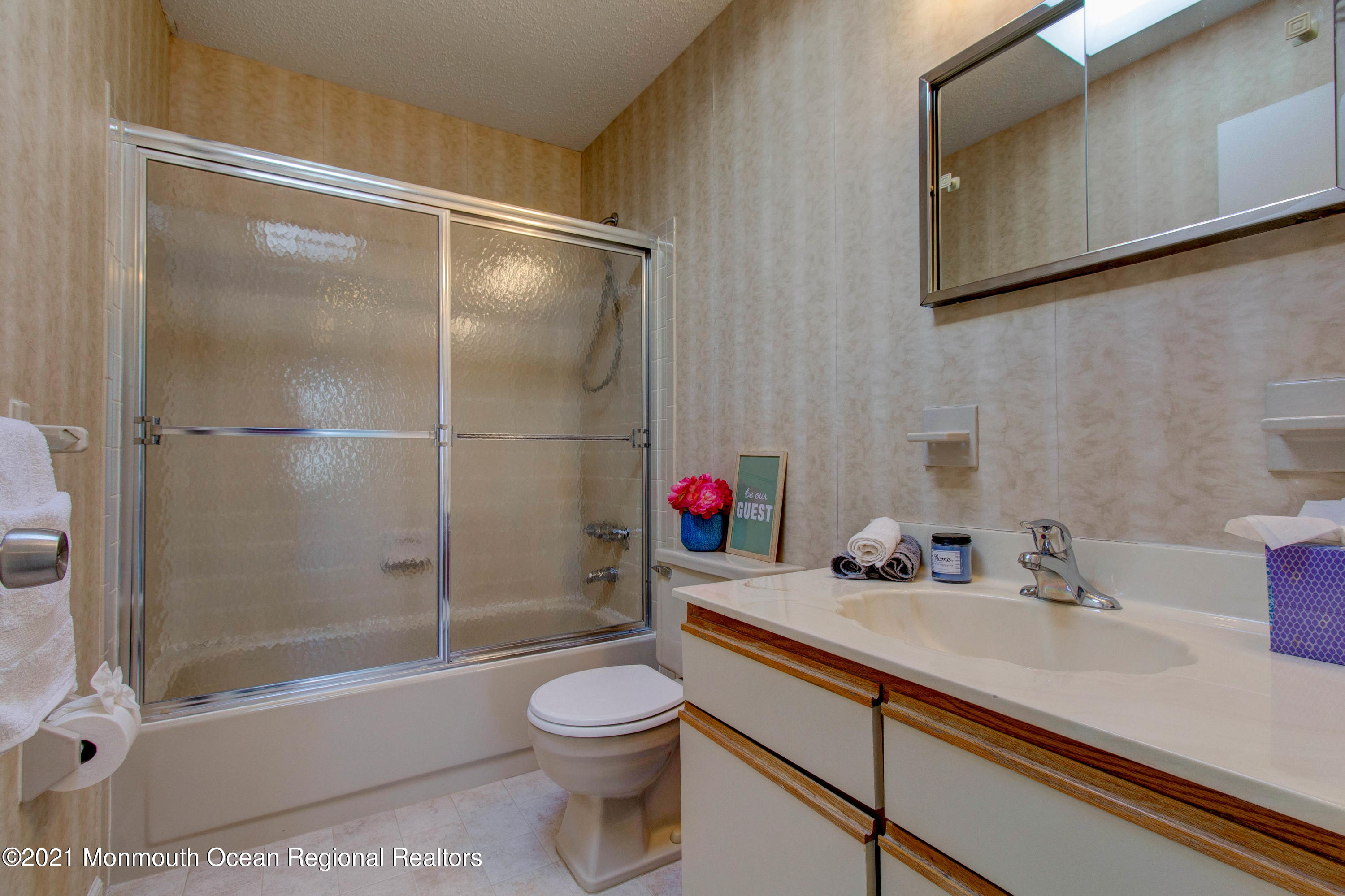 107 Reflection Road Toms River, NJ 08753 - Photo 20 of 29 a bathroom with a sink toilet and shower
