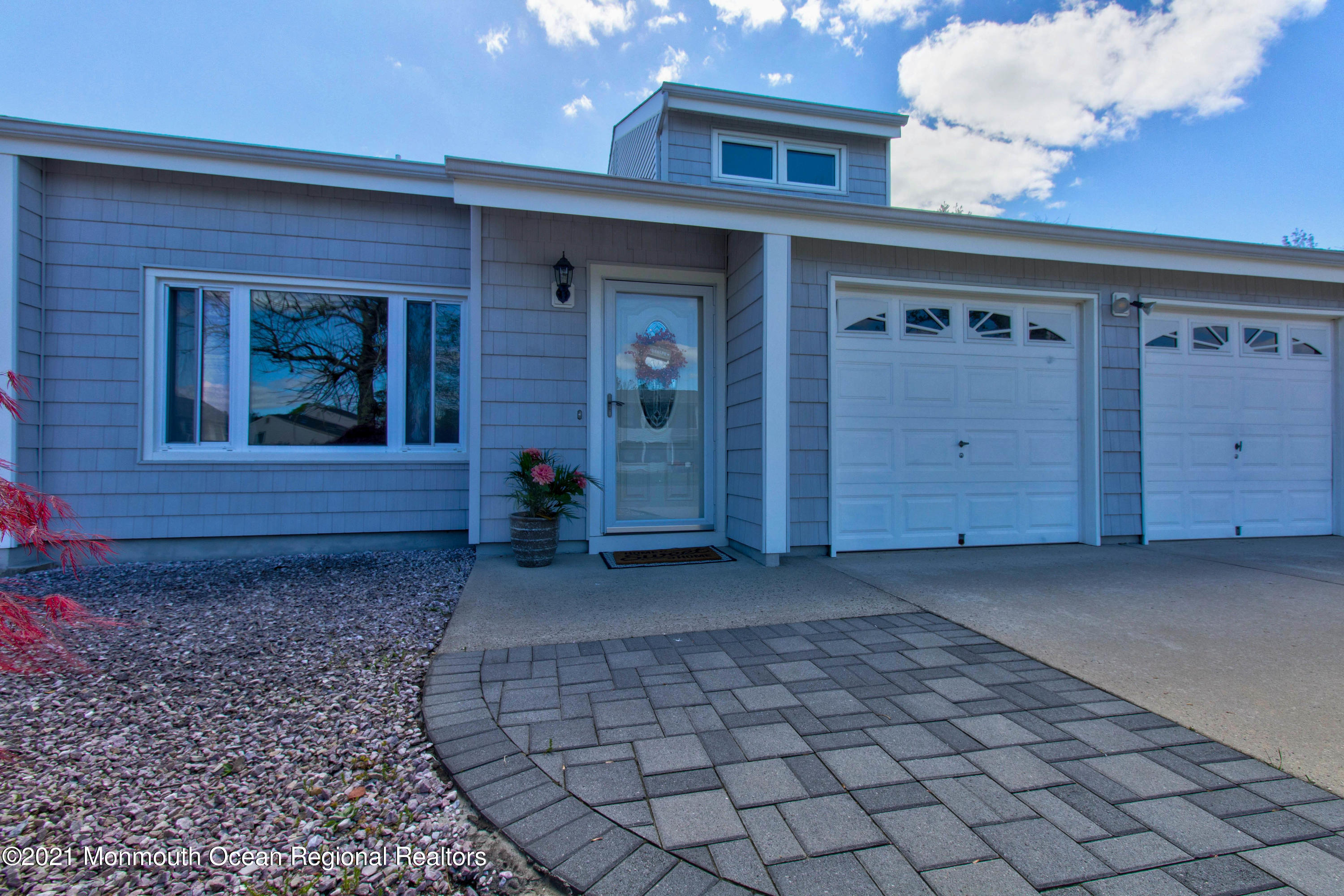 107 Reflection Road Toms River, NJ 08753 - Photo 3 of 29 a front view of a house with a yard
