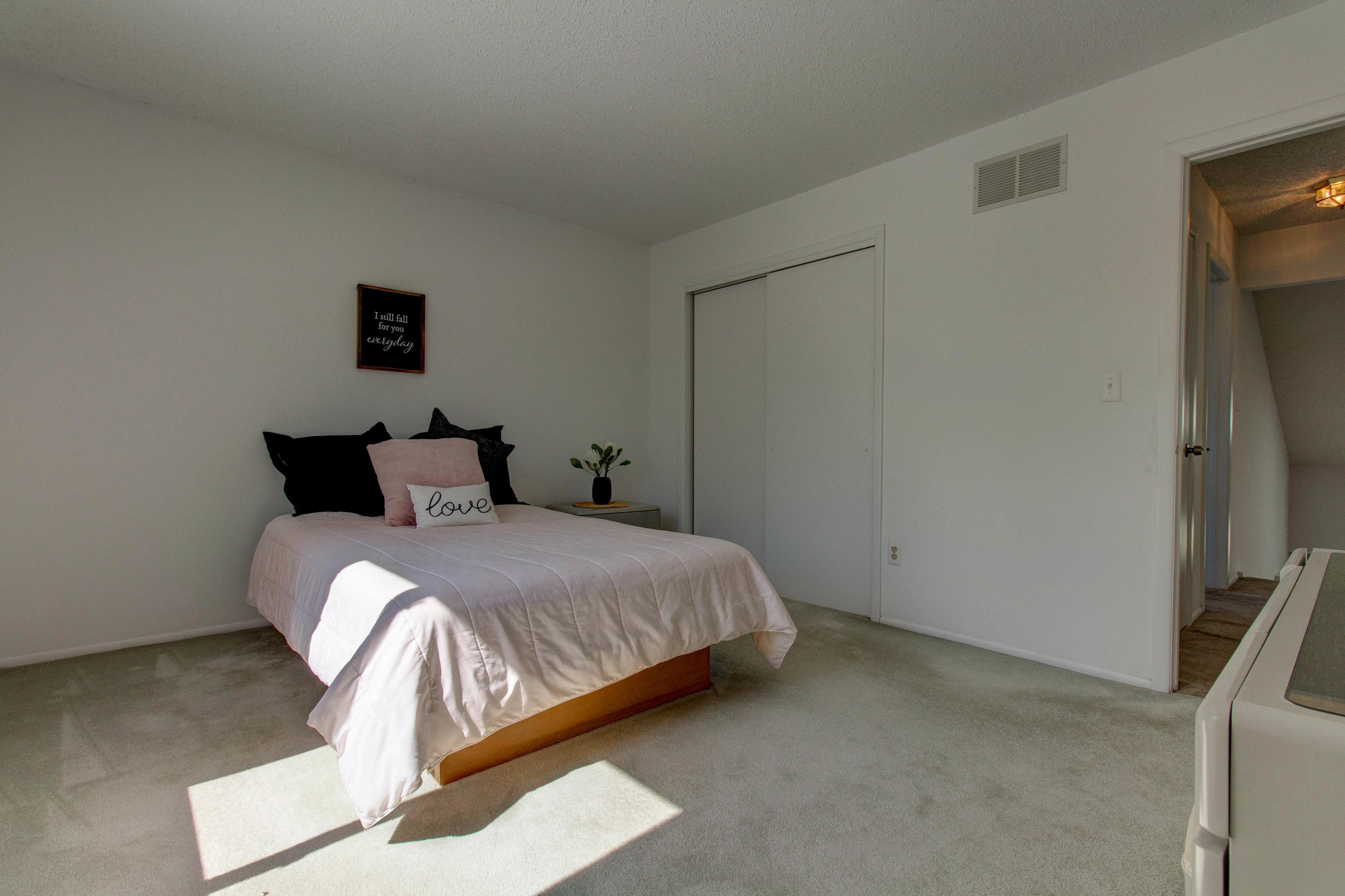 107 Reflection Road Toms River, NJ 08753 - Photo 24 of 29 a bedroom with a bed and a painting on the wall