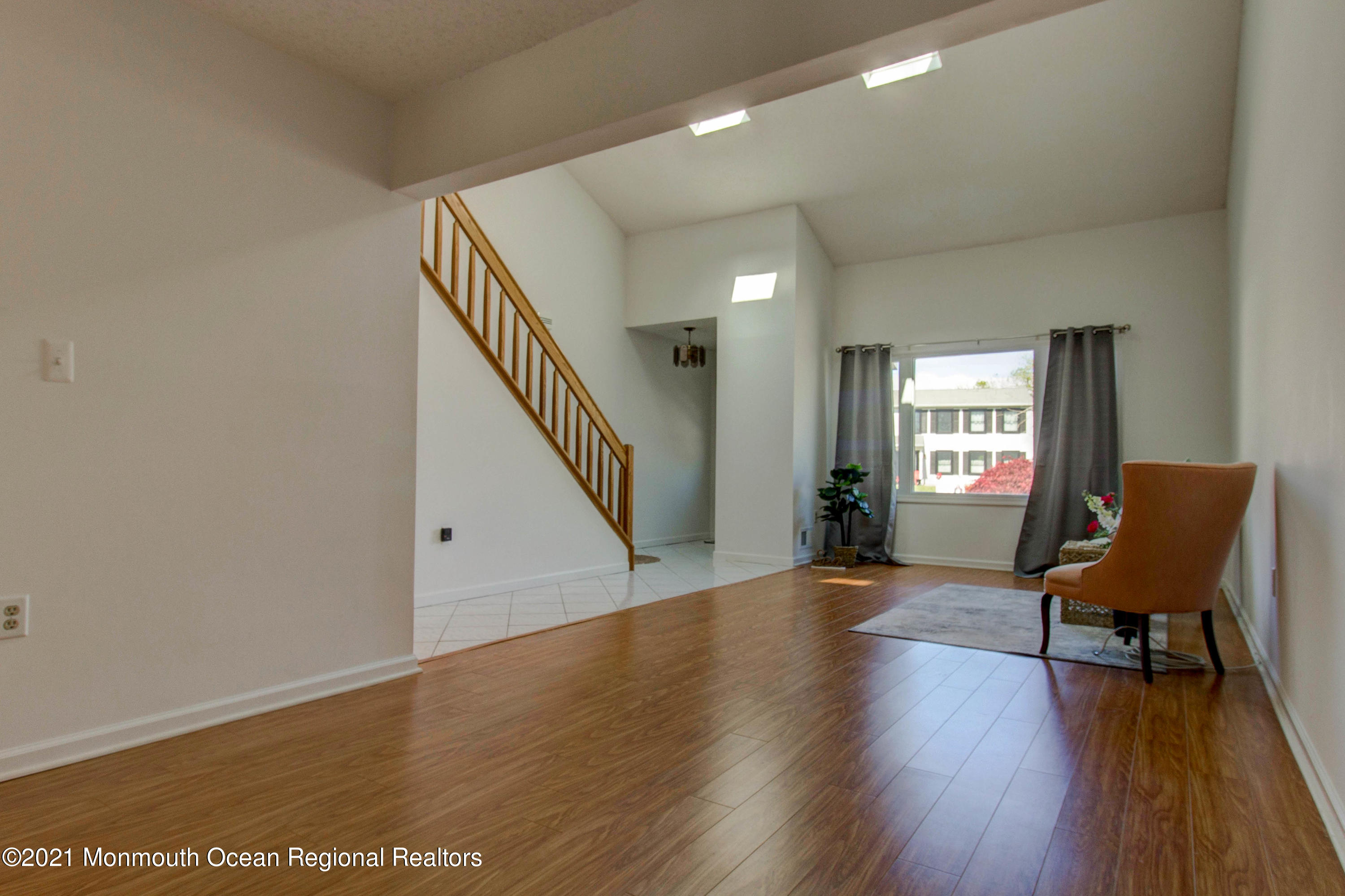 107 Reflection Road Toms River, NJ 08753 - Photo 8 of 29 a view of a livingroom with furniture and wooden floor