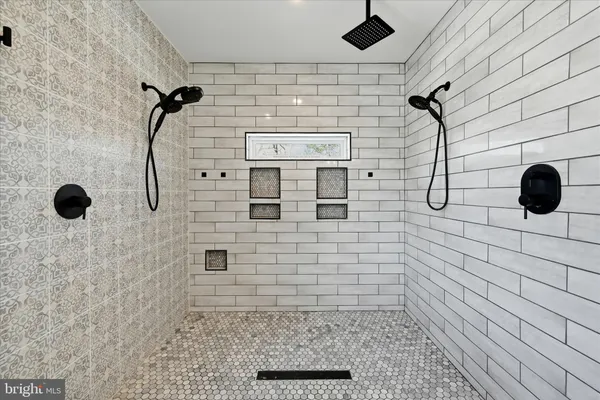 a view of a kitchen that has a sink and a window in it