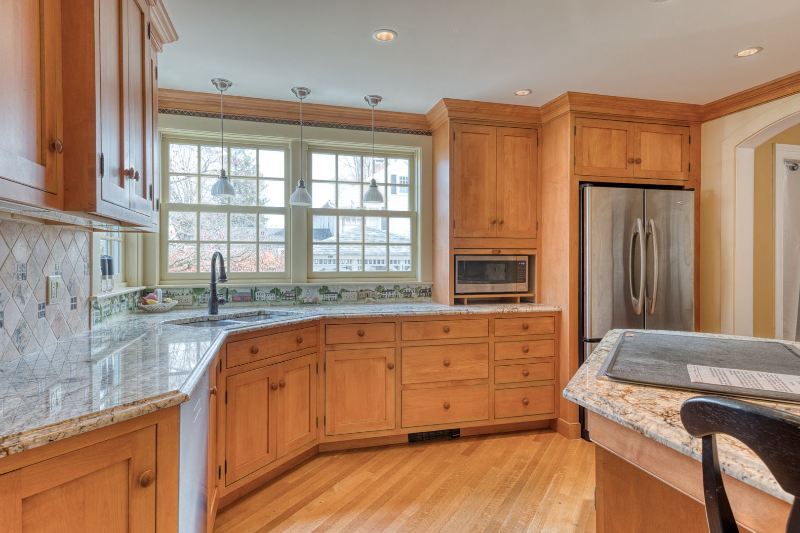 89 Maple Street Ellington, CT 06029 - Photo 18 of 40 a spacious bathroom with a granite countertop sink mirror and a bathtub