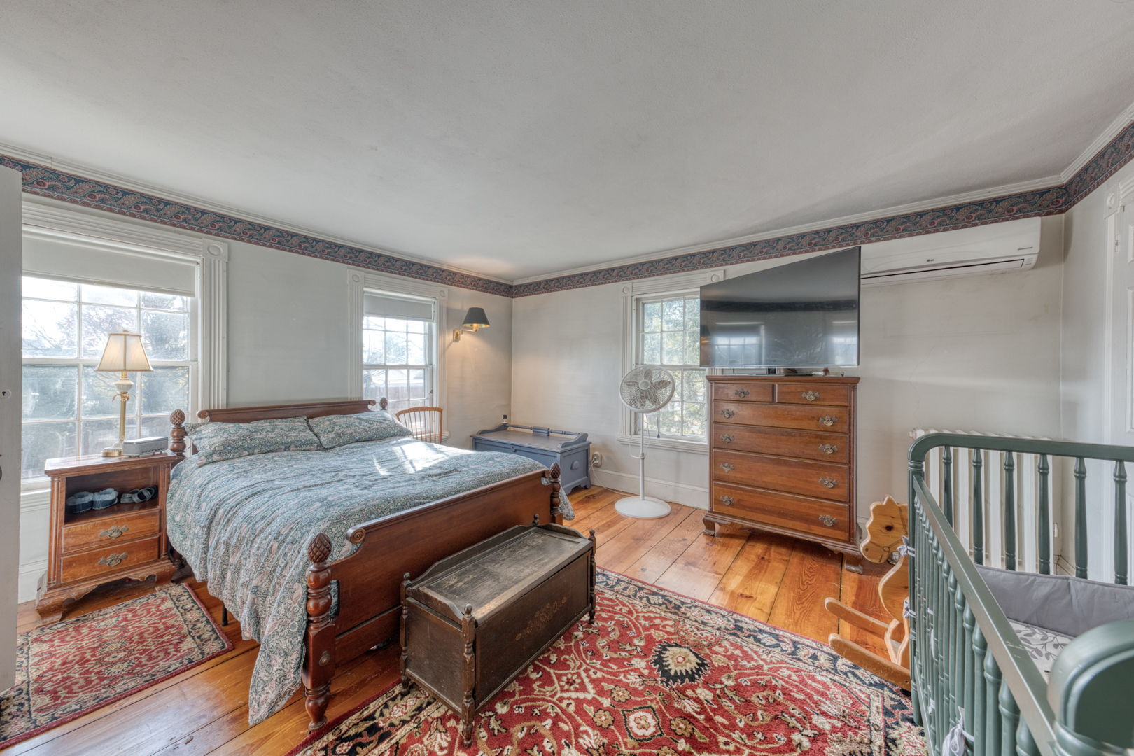 89 Maple Street Ellington, CT 06029 - Photo 25 of 40 a bedroom with a bed and a dresser