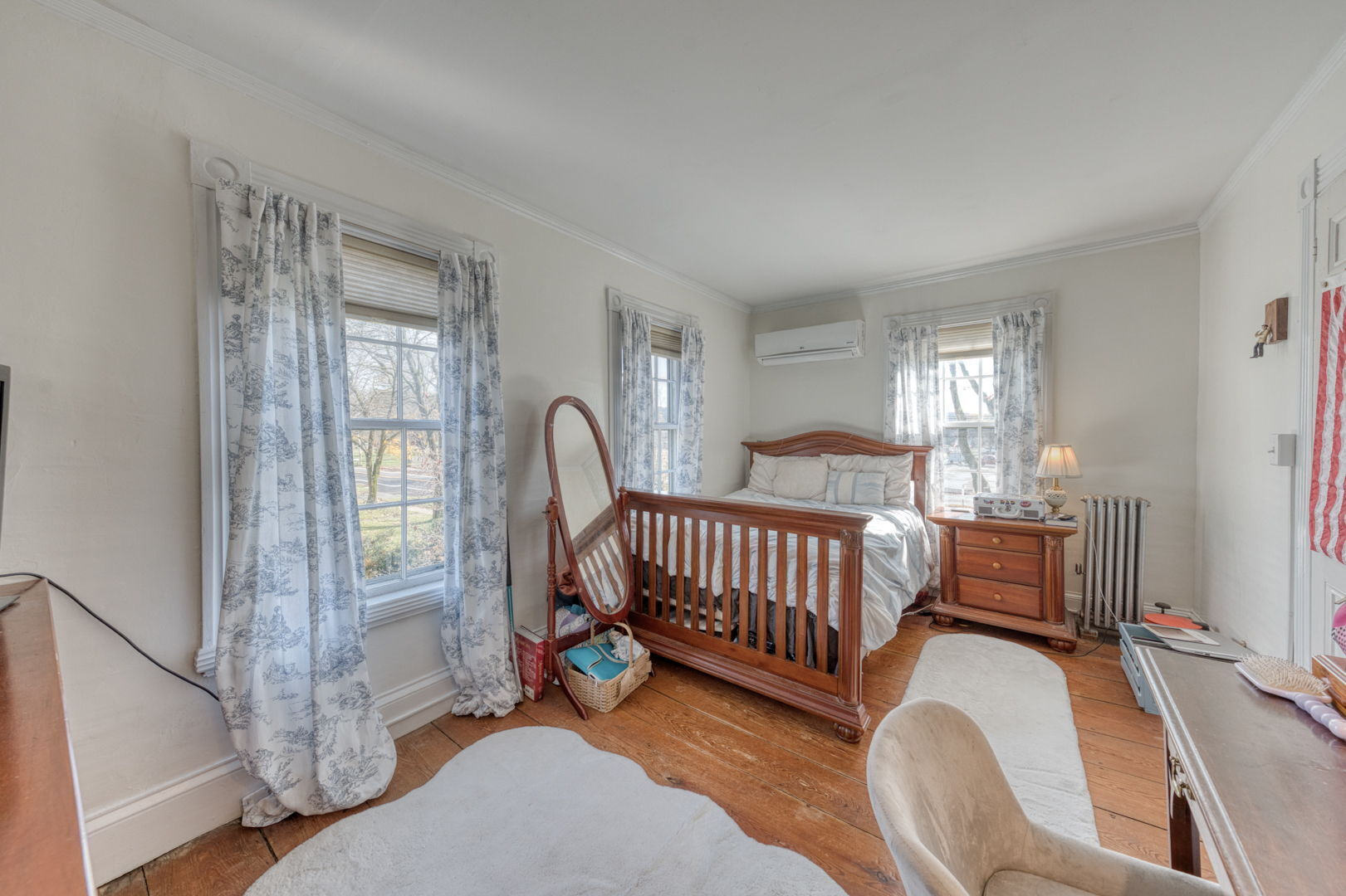 89 Maple Street Ellington, CT 06029 - Photo 26 of 40 a bedroom with furniture and a window