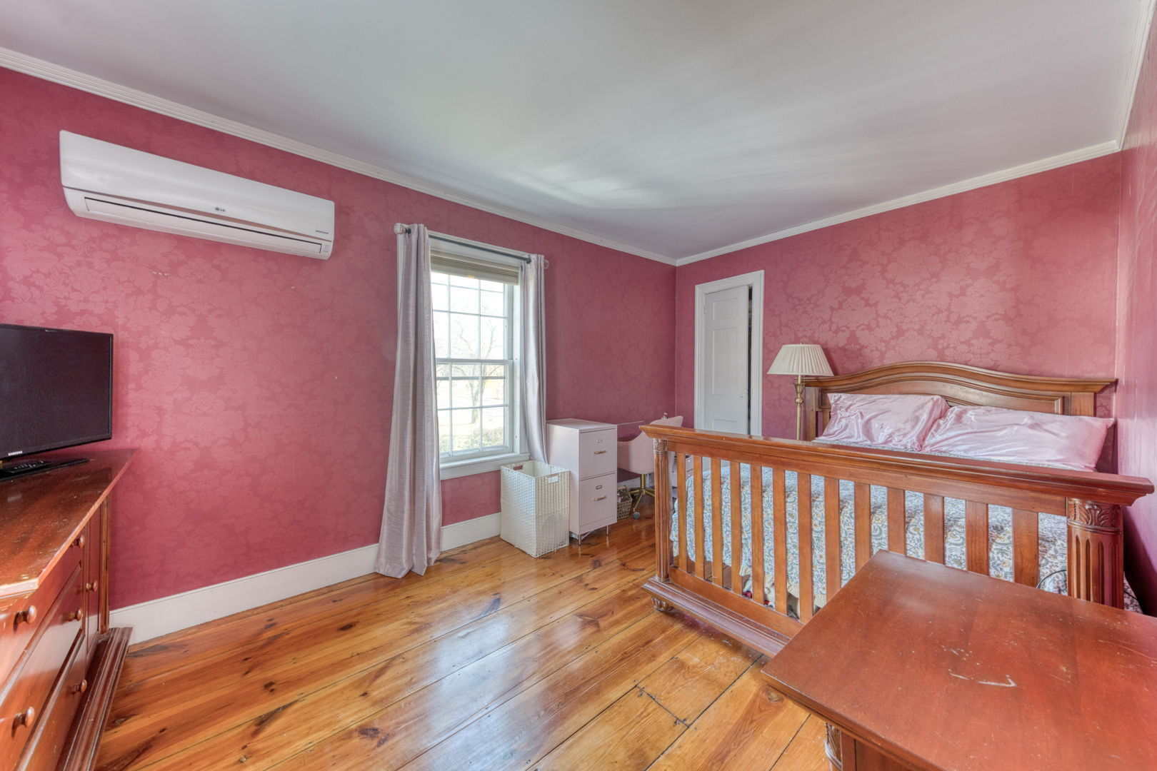 89 Maple Street Ellington, CT 06029 - Photo 27 of 40 a bedroom with furniture and a window