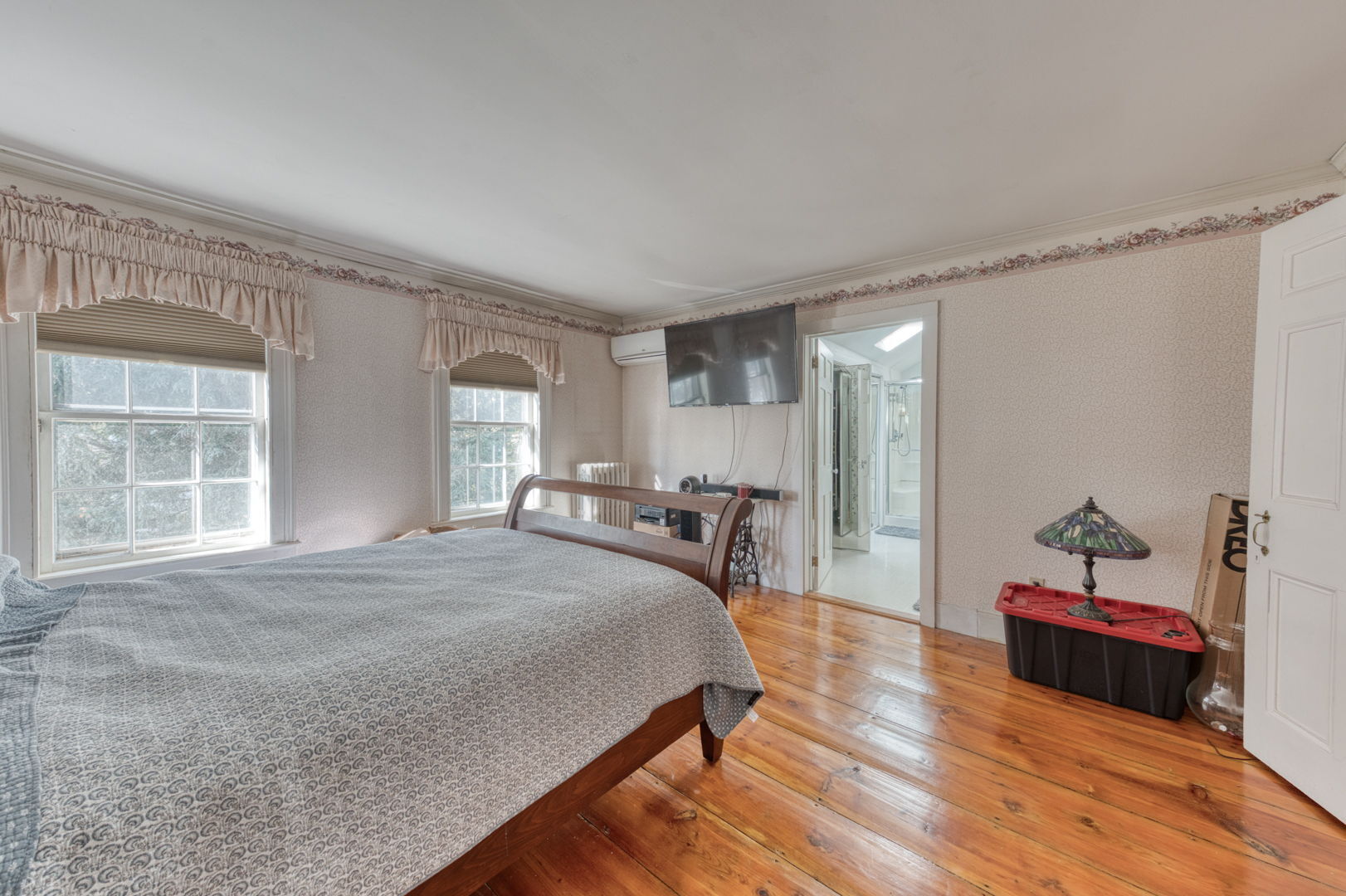 89 Maple Street Ellington, CT 06029 - Photo 28 of 40 a spacious bedroom with a bed and window