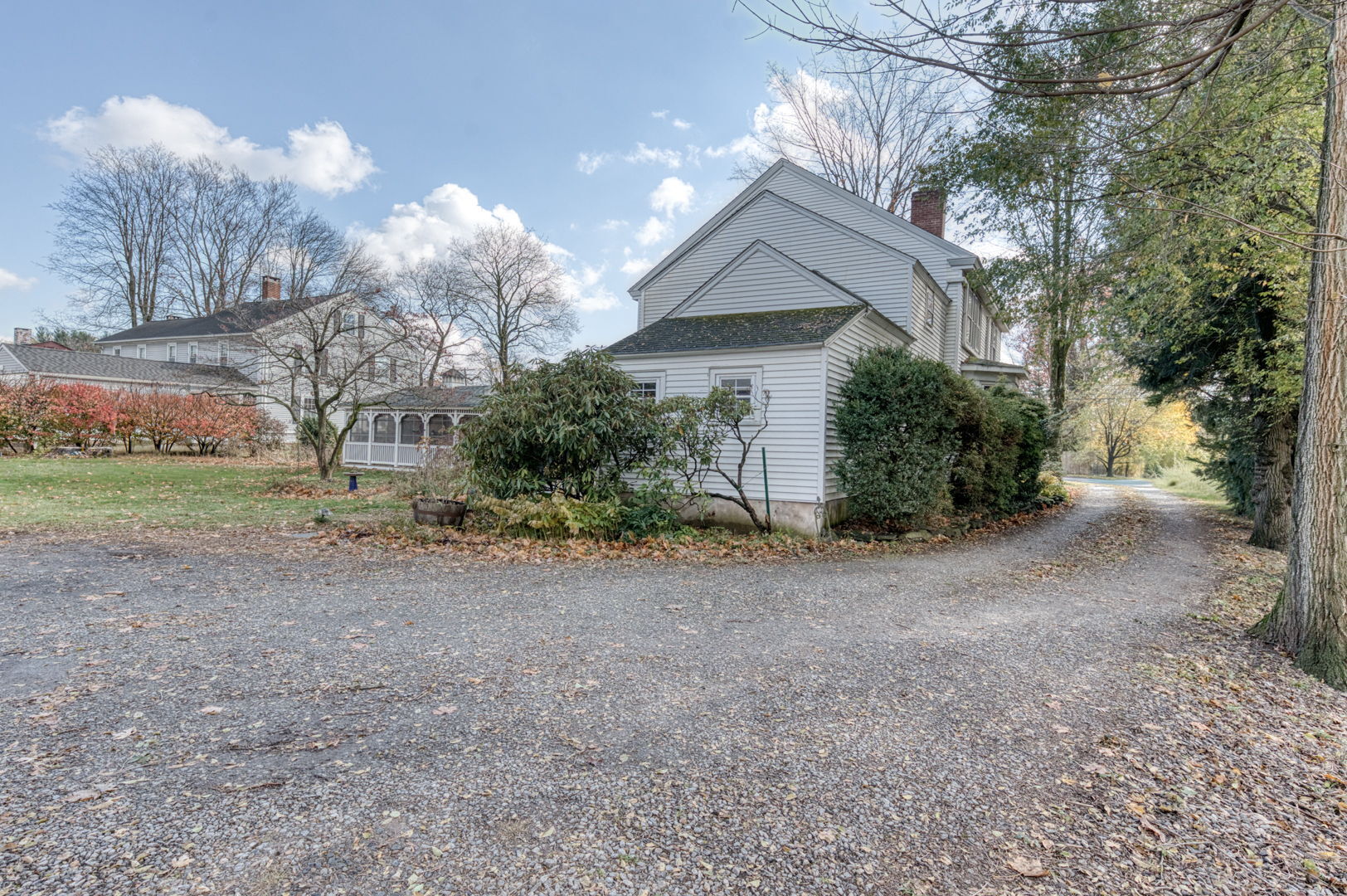 89 Maple Street Ellington, CT 06029 - Photo 37 of 40 a front view of a house with garden