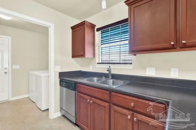 a bathroom with a sink a vanity and a mirror