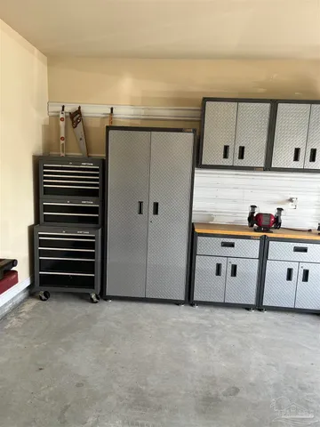 a kitchen with stainless steel appliances granite countertop a sink stove and a refrigerator