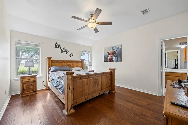 a bed room with bed and window