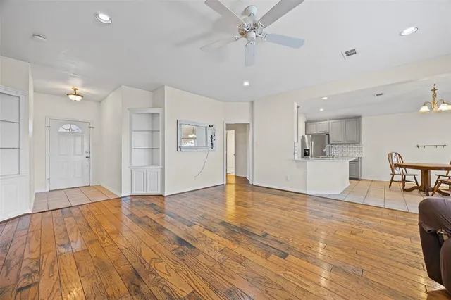 a view of a livingroom with wooden floor