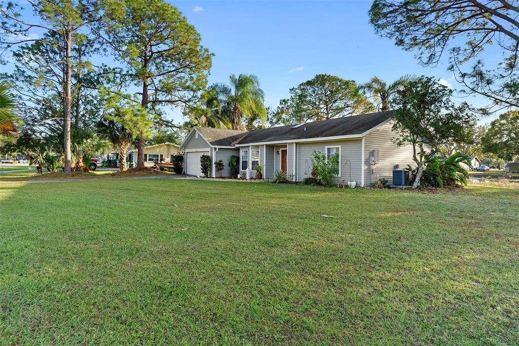 2573 Delaware Road Deltona, FL 32738 - Photo 24 of 31 front of home on right side